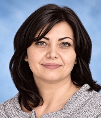 
 Mina Kirkova - therapist in Phoenix MD potrait photo on blue background